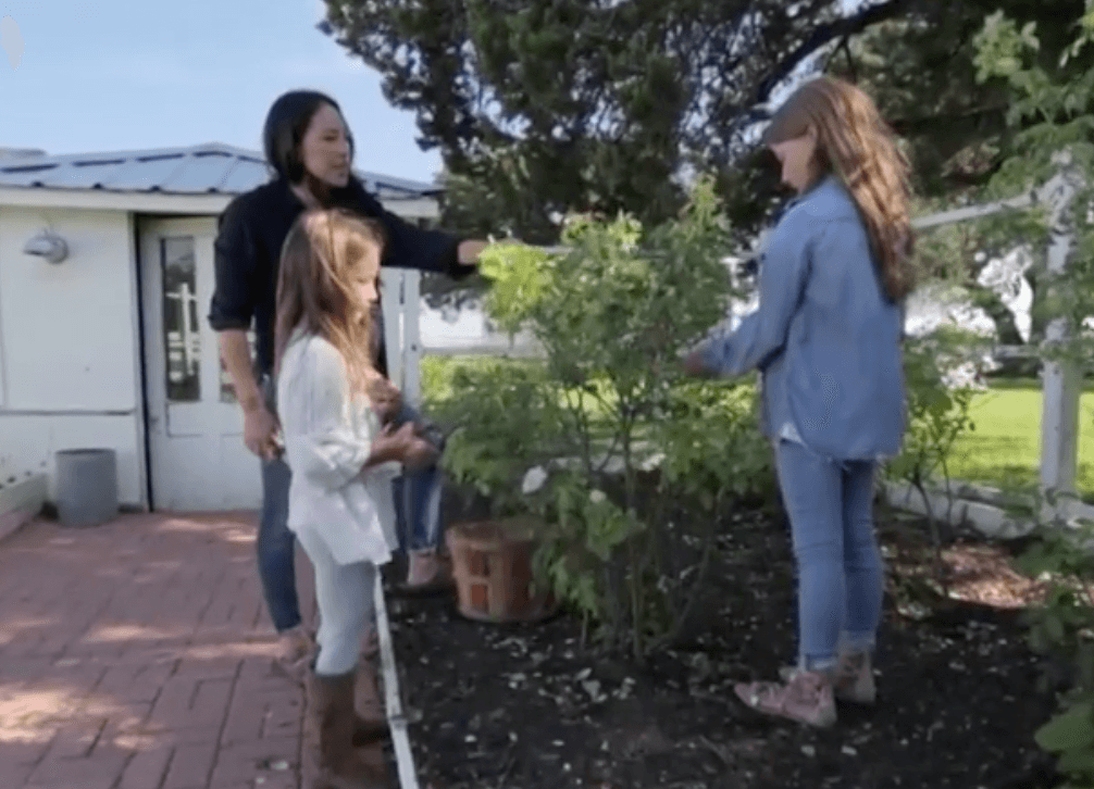 Ella Emmie and Joanna gardening