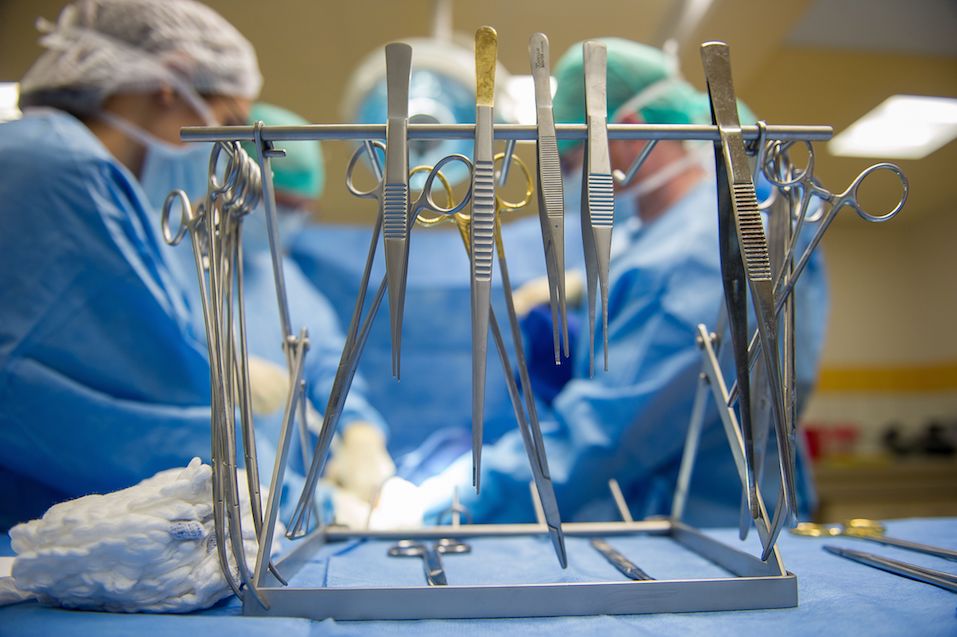 surgical scissors and forceps during a mock surgery