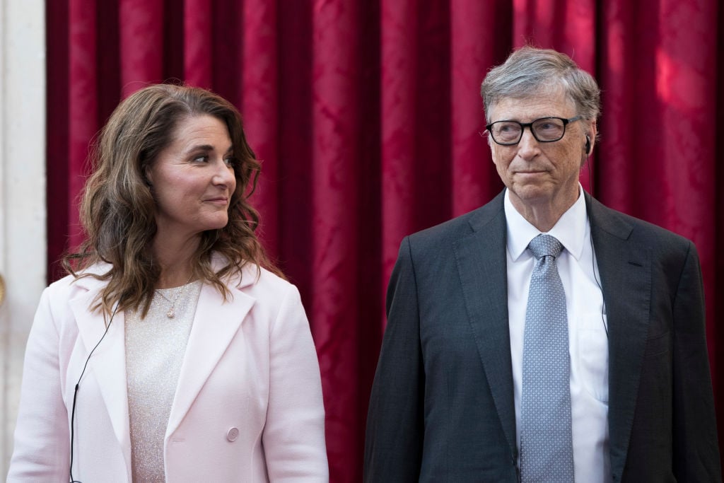 Microsoft co-founder Bill (R) and Melinda Gates pose before receiving the Commander of the Legion of Honour title at the Elysee Palace in Paris