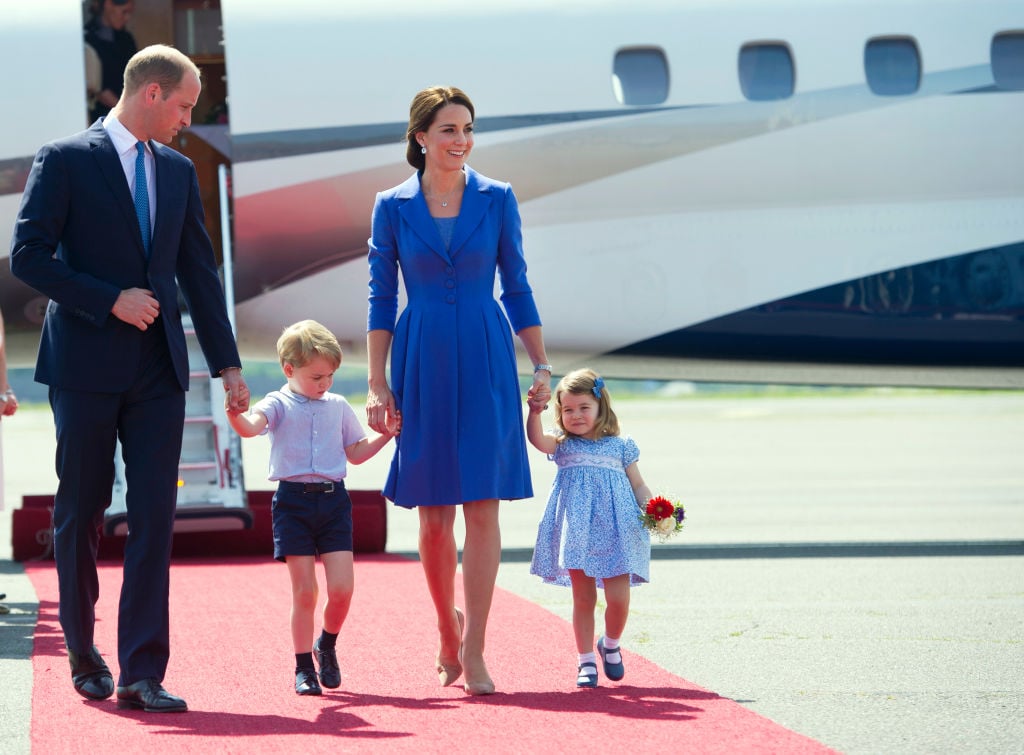 Britain's Prince William Duke of Cambridge, and his wife Kate the Duchess of Cambridge and their children Prince George and Princess Charlotte arrive at the airport in Berlin