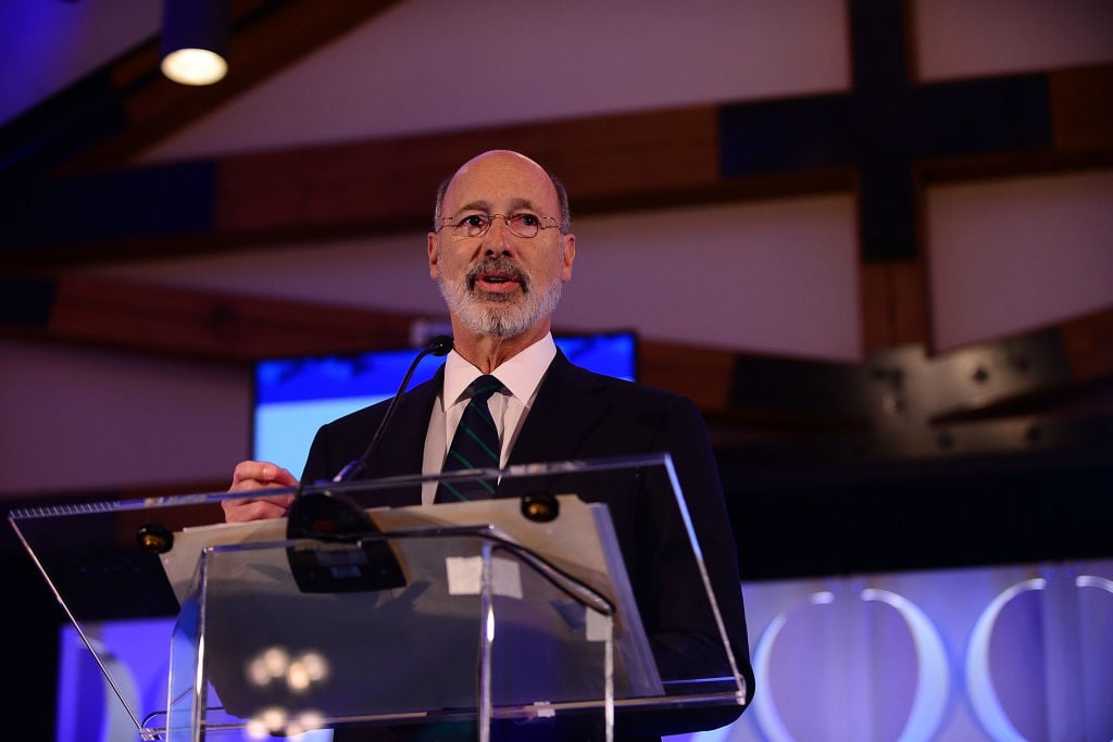 Pennsylvania Gov. Tom Wolf speaks on stage during the Geisinger National Symposium