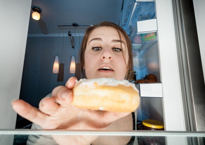 woman with doughnut