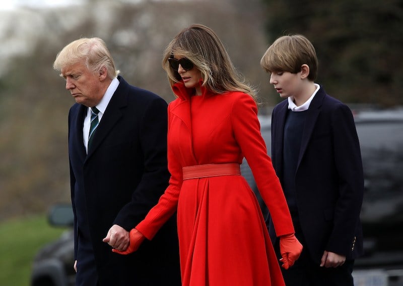 WASHINGTON, DC - MARCH 17: (L-R) U.S. President Donald Trump, First Lady Melania Trump and son Barron Trump prepare to depart the White House on March 17, 2017 in Washington, DC. President Trump is spending the weekend at his Mar-a-Lago estate in Florida. (Photo by Justin Sullivan/Getty Images)
