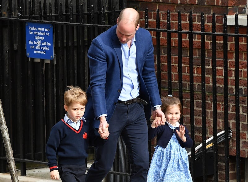 LONDON, ENGLAND - APRIL 23: Prince William, Duke of Cambridge arrives with Prince George and Princess Charlotte at the Lindo Wing after Catherine, Duchess of Cambridge gave birth to their son at St Mary's Hospital on April 23, 2018 in London, England. The Duchess safely delivered a boy at 11:01 am, weighing 8lbs 7oz, who will be fifth in line to the throne. (Photo by Gareth Cattermole/Gareth Cattermole/Getty Images)