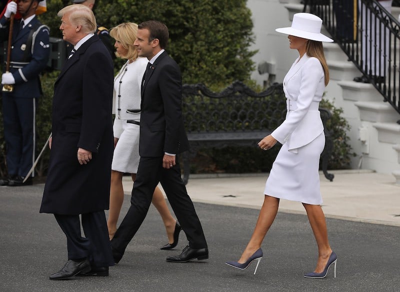WASHINGTON, DC - APRIL 24: U.S. President Donald Trump (L) and U.S. first lady Melania Trump (R) welcome French President Emmanuel Macron (2nd R) and his wife Brigitte to the White House during a state arrival ceremony April 24, 2018 in Washington, DC. Macron and Trump are scheduled to meet throughout the day to discuss a range of bilateral issues as Trump holds his first official state visit with the French president. (Photo by Chip Somodevilla/Getty Images)
