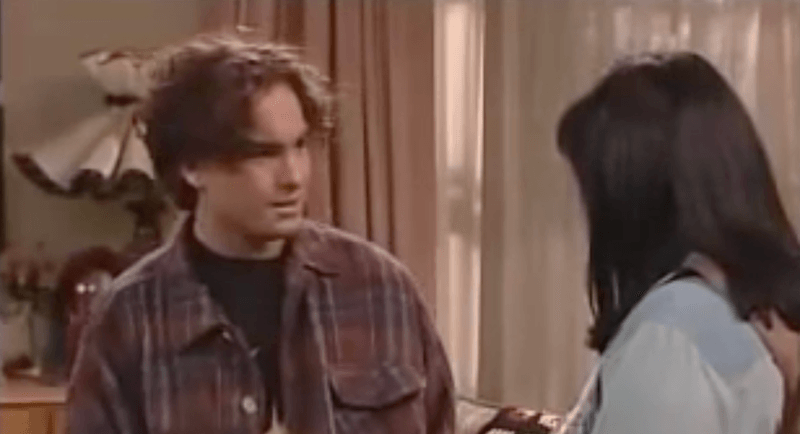 David talking to Roseanne in the living room. David talking to Roseanne in the living room.