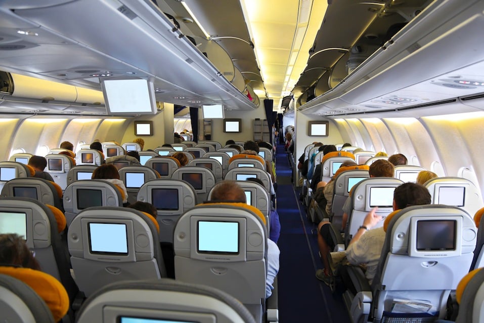 Passengers watching movie in an airplane 