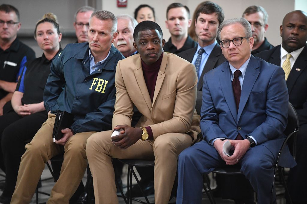 Waffle House patron James Shaw, Jr. (C) who stopped the shooting at a Waffle House where a gunman opened fire killing four and injuring two attends a press conference with FBI Special Agent In Charge, Matthew Espenshade (L) and Metro Nashville Mayor David Briley (right) on April 22, 2018 in Nashville.