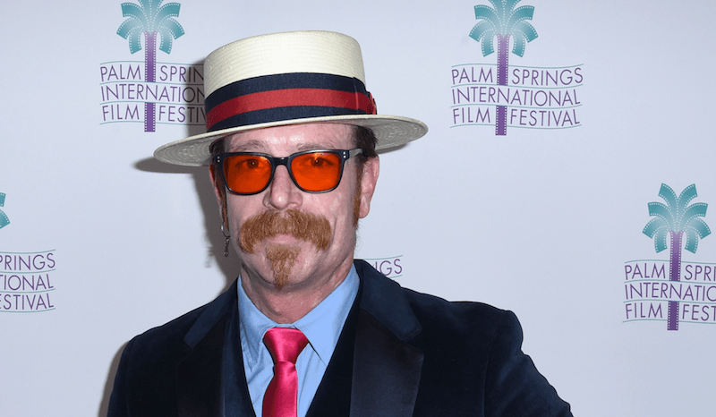 Jesse Hughes posing on a red carpet. Jesse Hughes posing on a red carpet.