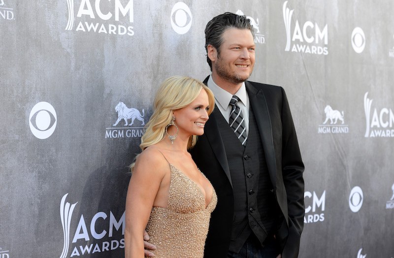 Miranda Lambert and Blake Shelton posing together. Miranda Lambert and Blake Shelton posing together.