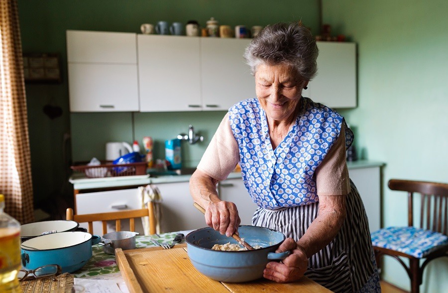 Senior lady cooking Senior lady cooking