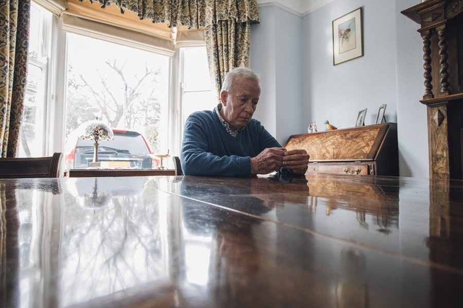 Old man sitting alone Old man sitting alone