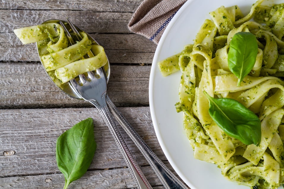Pesto pasta on white plate