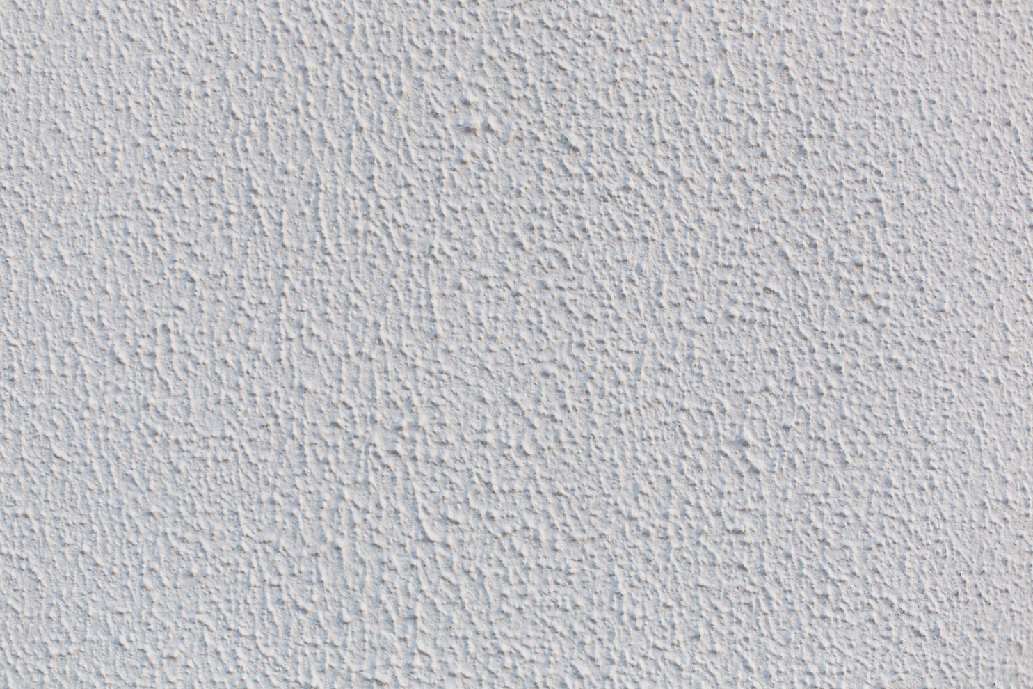 White popcorn ceiling wall