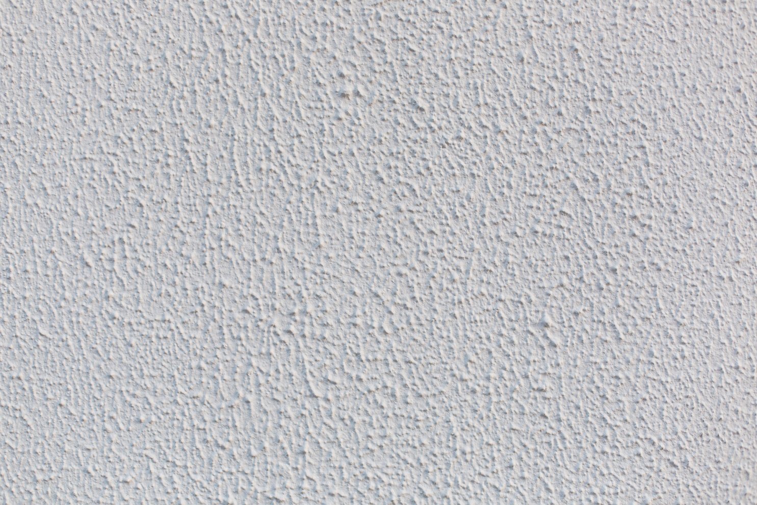 White popcorn ceiling wall