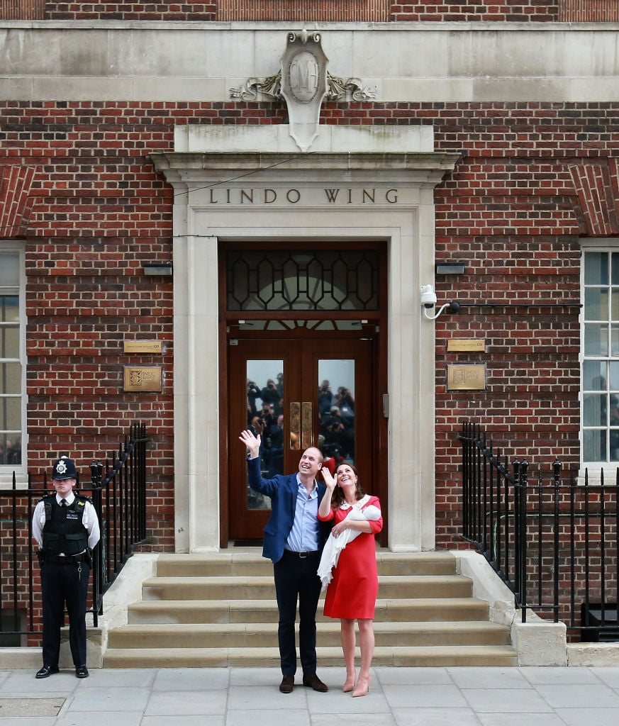 Prince William, Duke of Cambridge and Catherine, Duchess of Cambridge depart the Lindo Wing with their newborn son at St Mary's Hospital on April 23, 2018 in London, England.