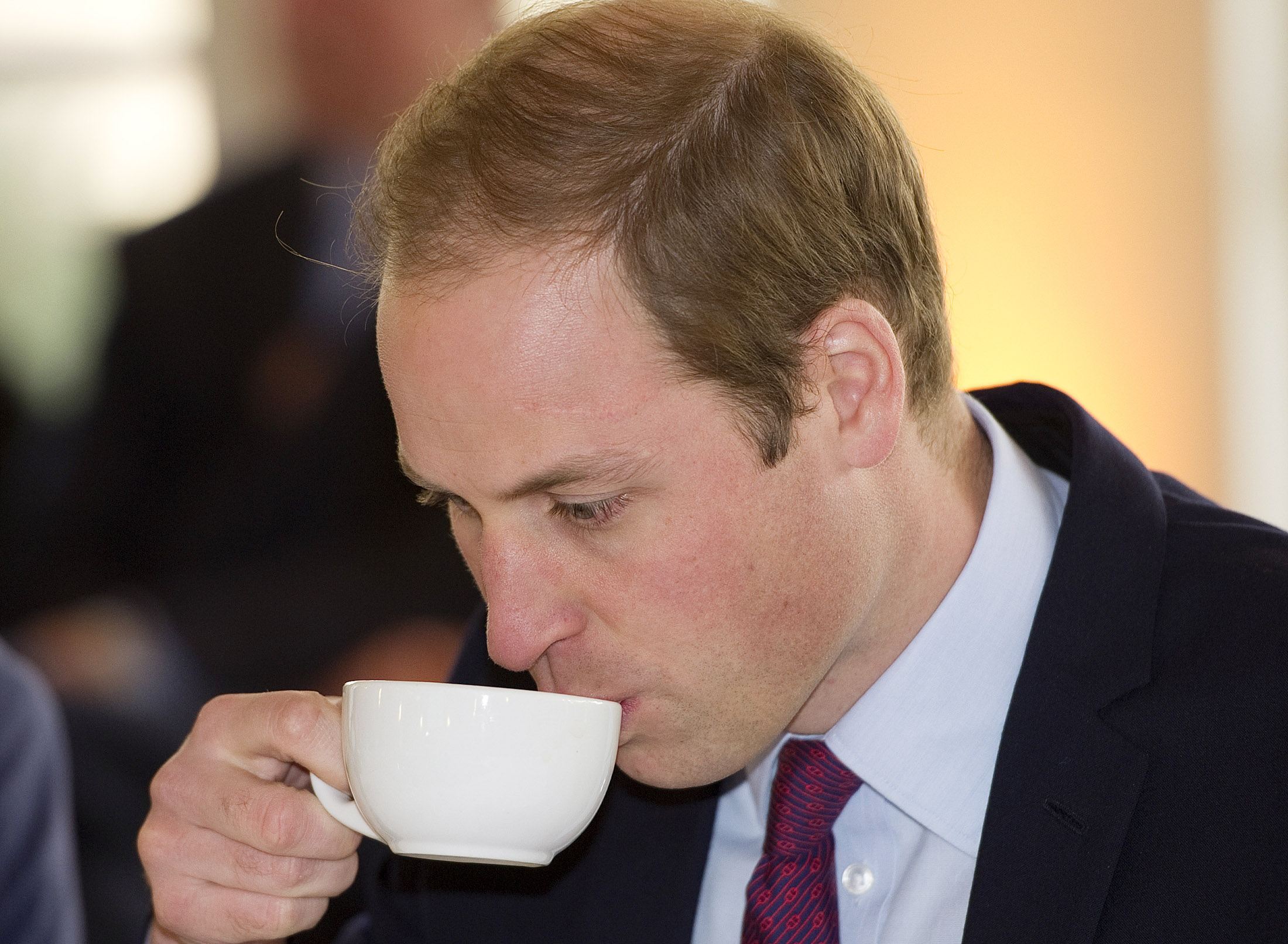 Prince William drinking tea