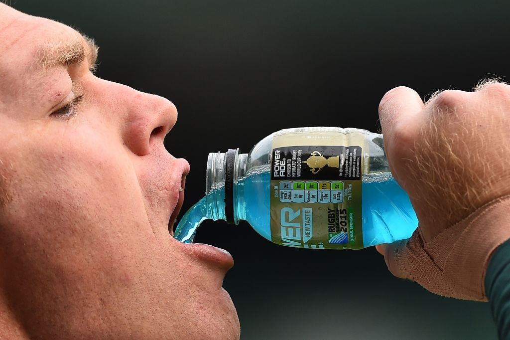 sportsman drinking an energy drink