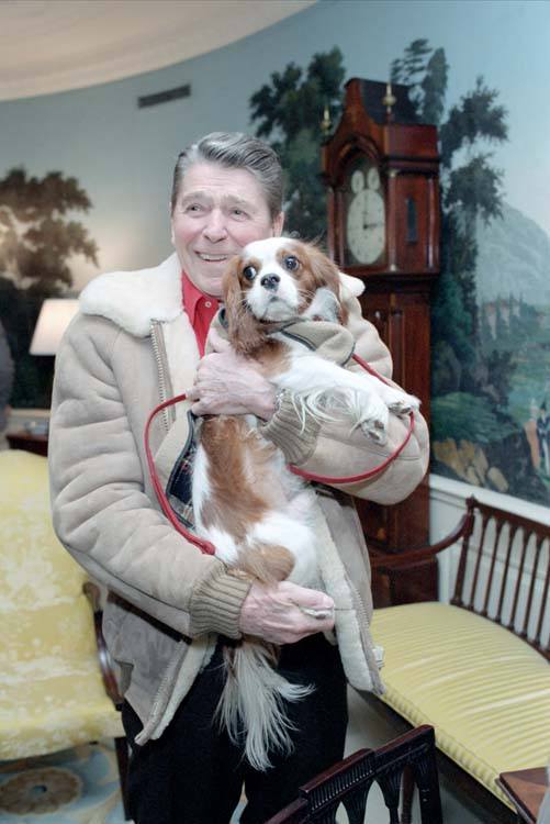 Ronald Reagan holding dog Rex