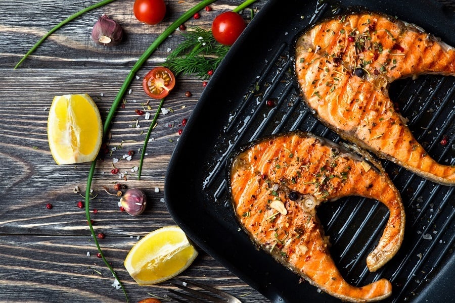 Grilled red fish steaks salmon on the grill pan Grilled red fish steaks salmon on the grill pan
