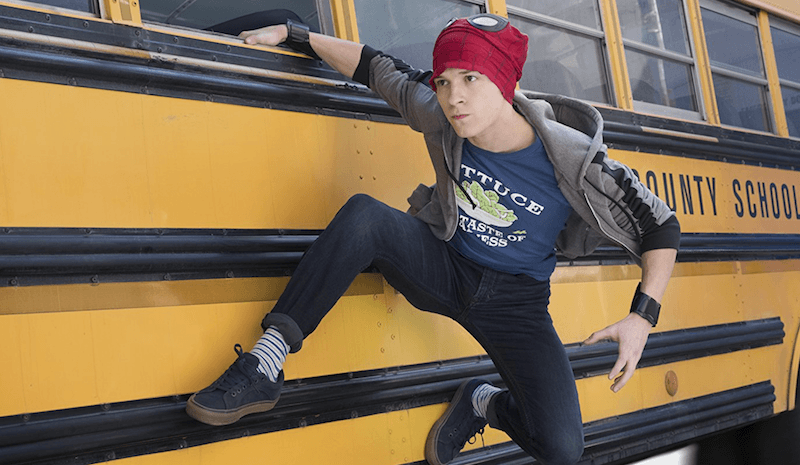 Peter on the side of a school bus wearing Spider-Man's mask. Peter on the side of a school bus wearing Spider-Man's mask.