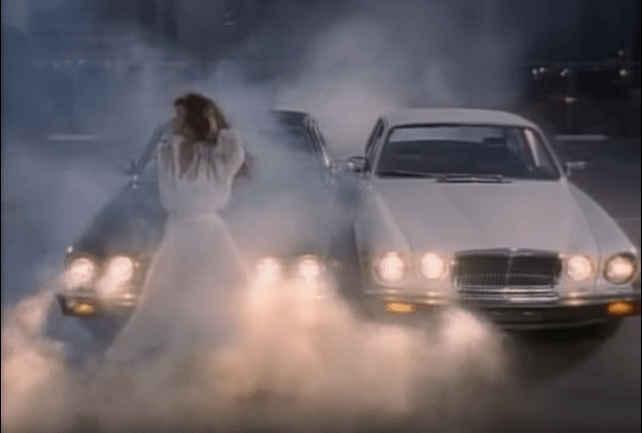 Tawnie Kataen in the music video for "Here I Go Again" by Whitesnake Tawnie Kataen in the music video for "Here I Go Again" by Whitesnake