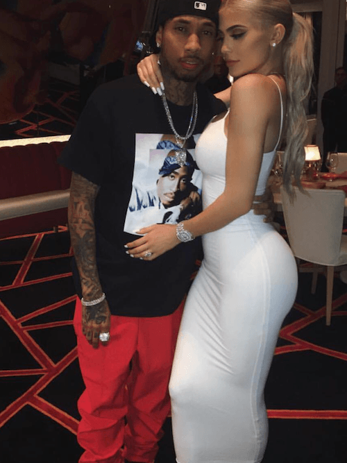 KylieJenner posing with Tyga. KylieJenner posing with Tyga.