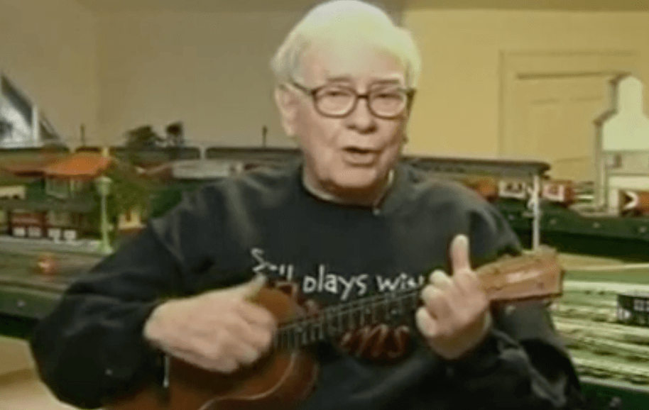 Warren Buffett playing the ukulele