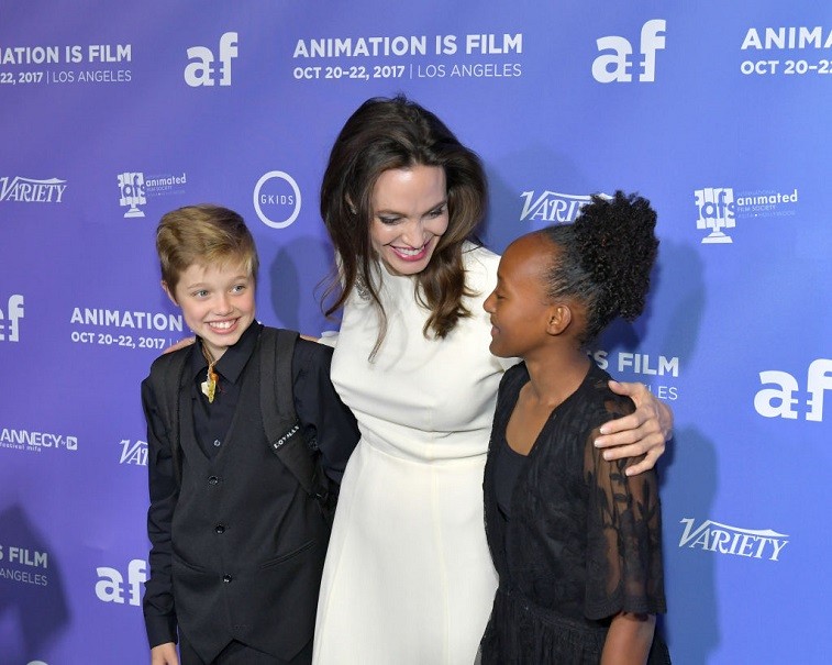 Angelina Jolie and her daughters, Shiloh and Zahara, attend the Premiere Of Gkids' "The Breadwinner" at TCL Chinese 6 Theatres on October 20, 2017 in Hollywood, California.