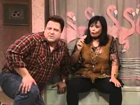 Dan and Roseanne sit on the edge of a bathtub Dan and Roseanne sit on the edge of a bathtub