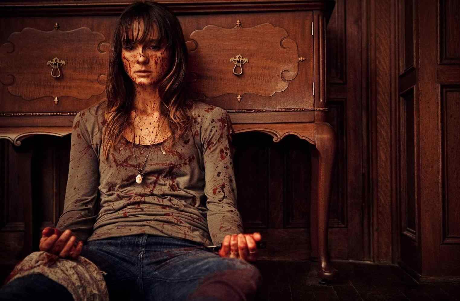 A woman in bloody clothes A woman in bloody clothes