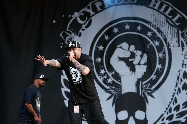 Recording artists Sen Dog and B-Real of the group Cypress Hill perform on stage at the "Rock The Bells" tour on Randall's Island on July 28, 2007 in New York City.