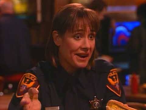 Jackie in a cops uniform Jackie in a cops uniform