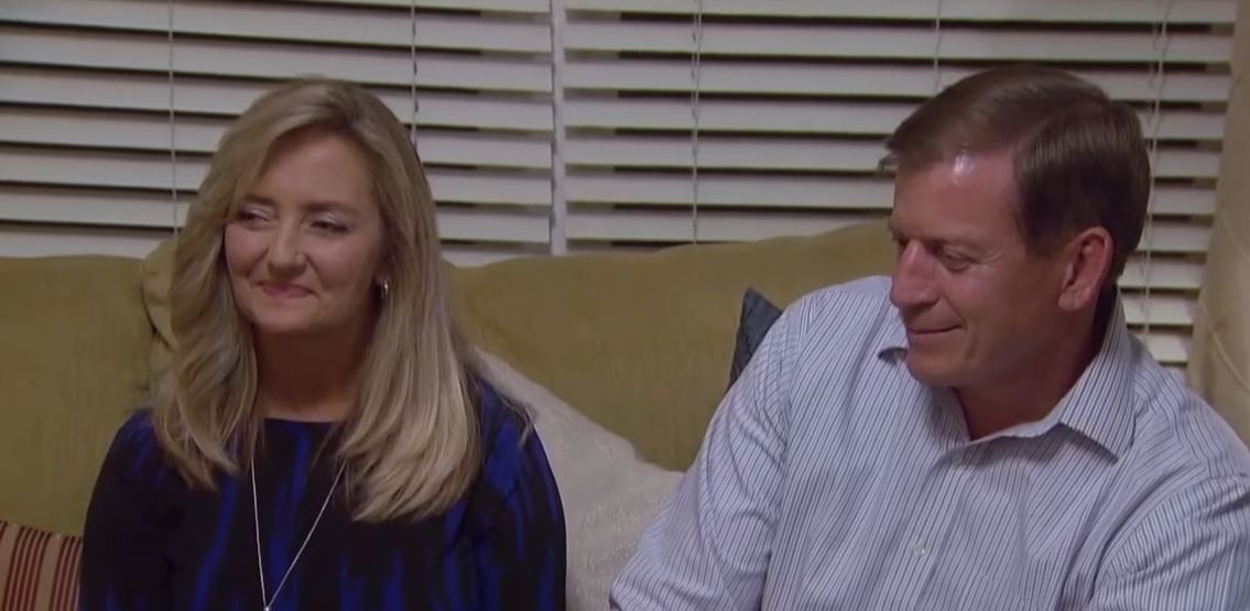 Lauren Burnham's parents sit on a sofa. Lauren Burnham's parents sit on a sofa.