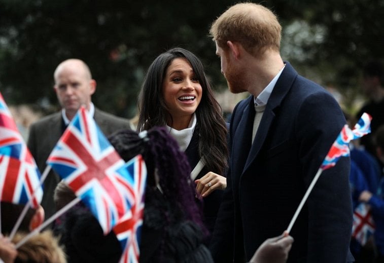 Prince Harry and Meghan Markle meet local school children during a visit to Birmingham on March 8, 2018 in Birmingham, England.