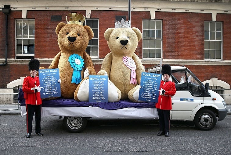 Two actors dressed as Guardsmen from a bookmakers hold up odds on the Royal Baby's name as the World's media wait for Catherine, Duchess of Cambridge to go into labour at St Mary's Hospital on May 1, 2015 in London, England. Catherine, Duchess of Cambridge is expected to give birth at the Lindo wing sometime in the next couple of weeks. Two actors dressed as Guardsmen from a bookmakers hold up odds on the Royal Baby's name as the World's media wait for Catherine, Duchess of Cambridge to go into labour at St Mary's Hospital on May 1, 2015 in London, England. Catherine, Duchess of Cambridge is expected to give birth at the Lindo wing sometime in the next couple of weeks.
