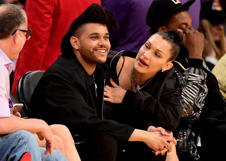 The Weeknd (Abel Tesfaye) & Bella Hadid are seen sitting courtside as the Los Angeles Lakers take on the Utah Jazz at Staples Center on April 13, 2016 in Los Angeles, California. 