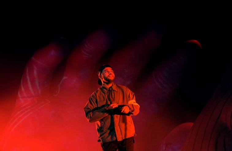 The Weeknd performs onstage during the 2018 Coachella Valley Music And Arts Festival at the Empire Polo Field on April 13, 2018 in Indio, California. The Weeknd performs onstage during the 2018 Coachella Valley Music And Arts Festival at the Empire Polo Field on April 13, 2018 in Indio, California.