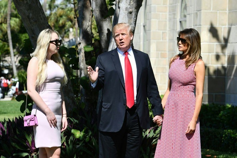 Tiffany Trump, Donald Trump and Melania Trump standing together. Tiffany Trump, Donald Trump and Melania Trump standing together.