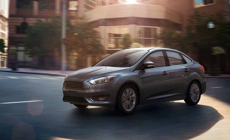 Road shot of gray Ford Focus sedan, Titanium trim