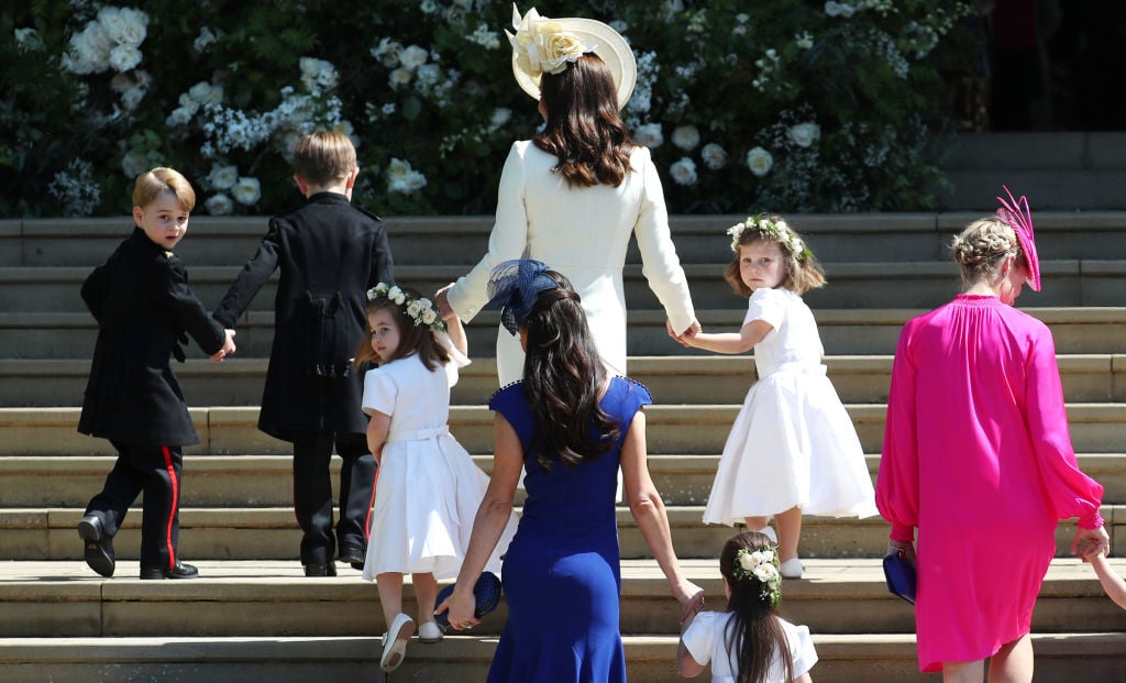 Britain's Catherine, Duchess of Cambridge walks up the west steps with Prince George and Princess Charlotte