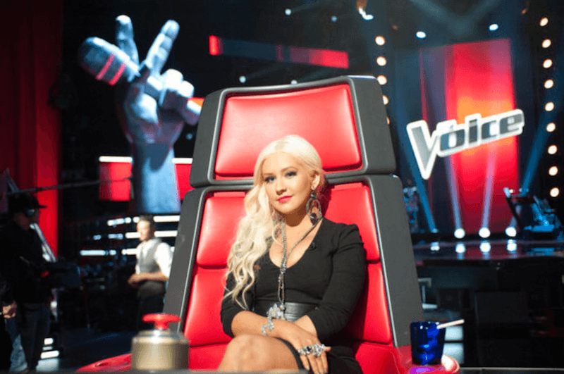 Christina Aguilera in her red chair