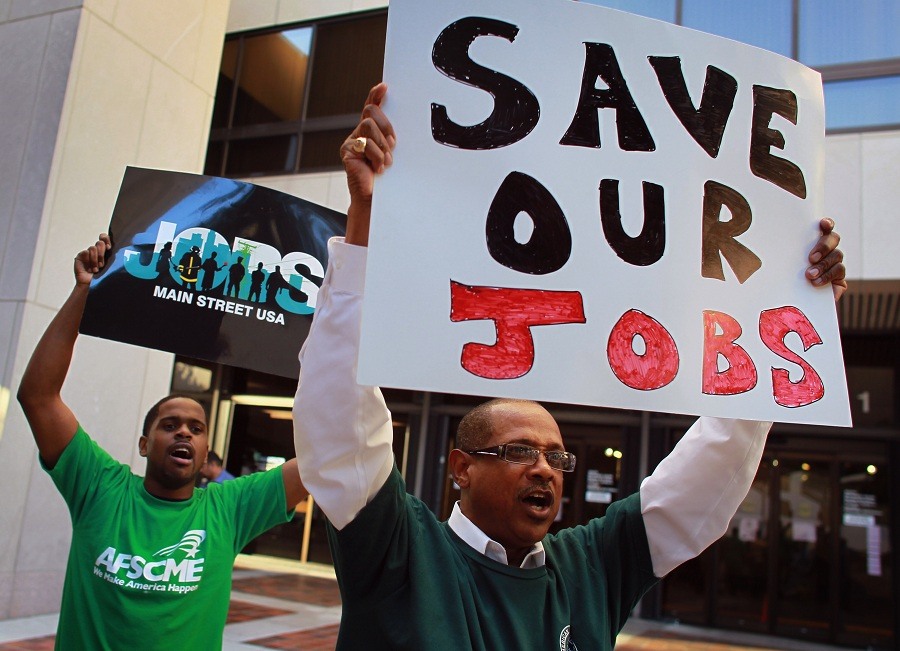 protest against Florida Gov. Rick Scott's state budget