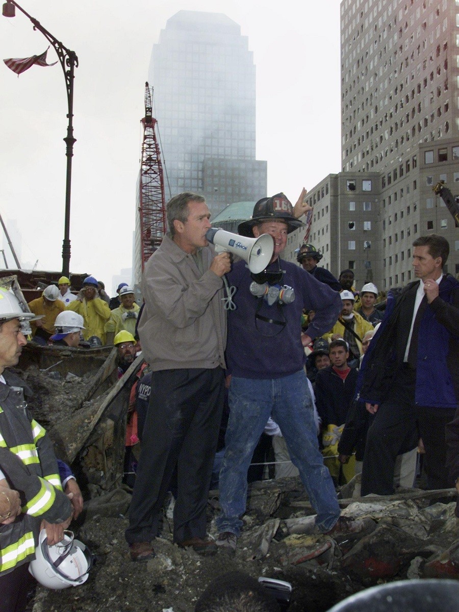 George-W.-Bush-and-firefighter. George-W.-Bush-and-firefighter.