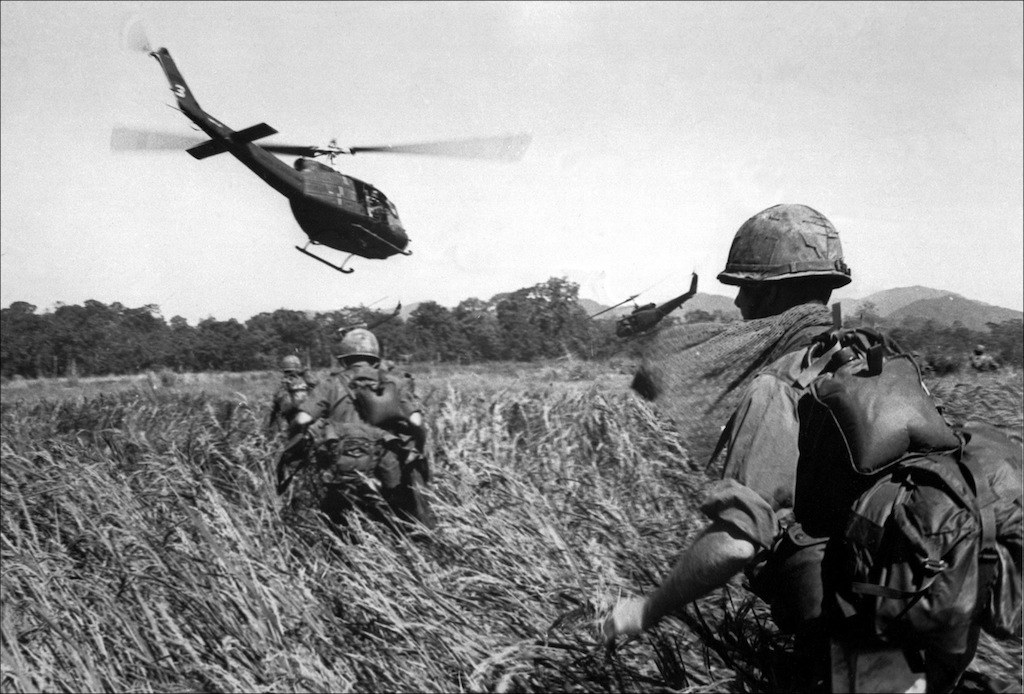 American soldiers of the 173th airborne are evacuated by helicopter from a Vietcong position in December 1965.