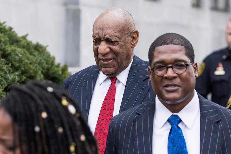 Actor and comedian Bill Cosby leaves with his spokesman Andrew Wyatt after a pretrial hearing in the sexual assault trial against actor and comedian Bill Cosby at the Montgomery County Courthouse in Norristown, Pennsylvania on March 30, 2018<br />