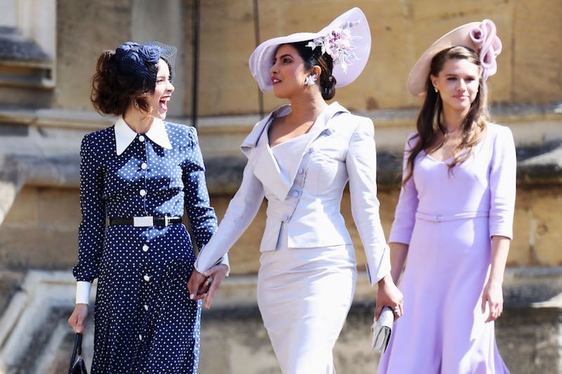 US actress Abigail Spencer and Bollywood actress Priyanka Chopra arrive for the wedding ceremony of Britain's Prince Harry, Duke of Sussex and US actress Meghan Markle at St George's Chapel, Windsor Castle, in Windsor, on May 19, 2018.