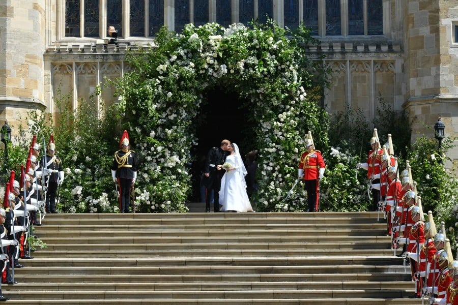 Prince Harry and Meghan Markle on chapel steps
