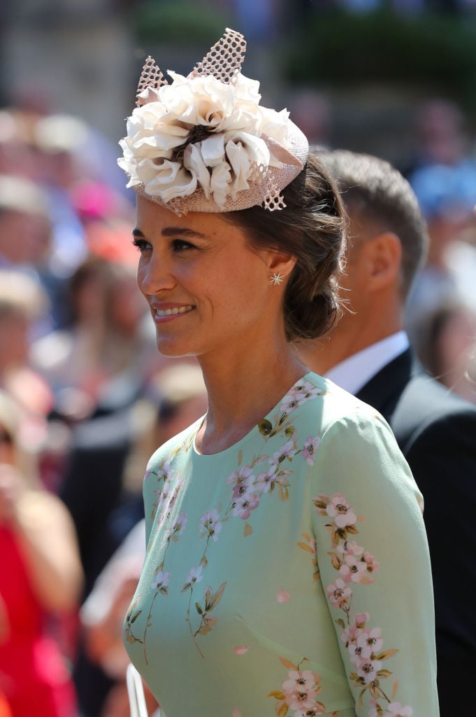 Pippa Middleton leaves St George's Chapel at Windsor Castle after the wedding of Prince Harry to Meghan Markle on May 19, 2018 in Windsor, England.