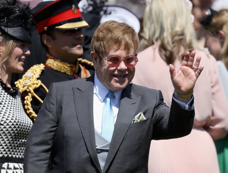 Sir Elton John arrives at the wedding of Prince Harry to Ms Meghan Markle at St George's Chapel, Windsor Castle on May 19, 2018 in Windsor, England. Sir Elton John arrives at the wedding of Prince Harry to Ms Meghan Markle at St George's Chapel, Windsor Castle on May 19, 2018 in Windsor, England.